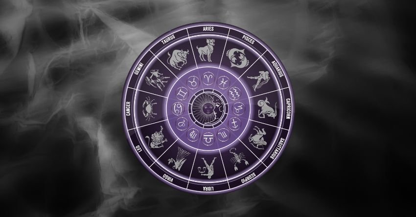 Purple zodiac wheel on a misty dark background with a mysterious cosmic atmosphere