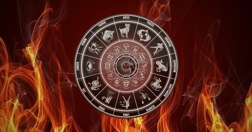Zodiac wheel surrounded by flames representing astrology and zodiac signs